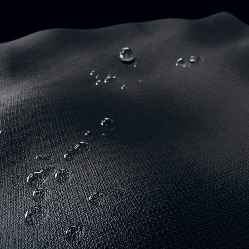 Detail of face textile with water droplets